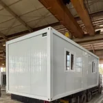 Portable office container manufactured with high-quality insulated panels for long-lasting performance and comfortable working conditions.