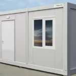 Modern portable office container with insulated wall panels, ideal for temporary offices and project management.