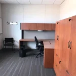 Fully furnished container office with office furniture, storage cabinets and workspace ready for immediate use.